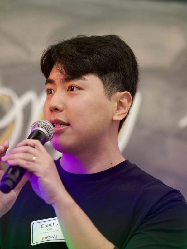 Dongho Kim speaking at SkAI Fest 2026